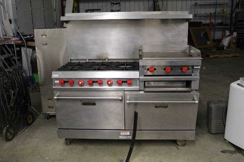 lot 87 image: Commercial Gas OvenStove & Exhaust Hood