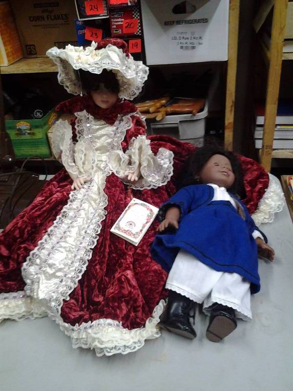 lot 44 image: Tote With 2 Dolls (1-Porcelain With Stand)Large Wooden Dowel RackDisplay 36 Inches