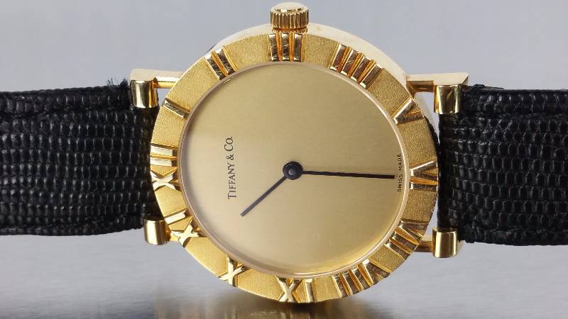 lot 5A image: Tiffany and Co. 18k Gold Atlas Mens Watch