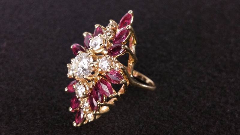 lot 10E image: Ruby and Diamond Ring in 14kt Gold - $21,675 Retail Price