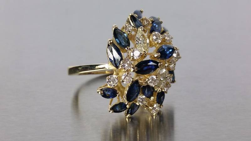 lot 20B image: Sapphire and Diamond Ring in 14kt Gold - $17,000 Retail Price