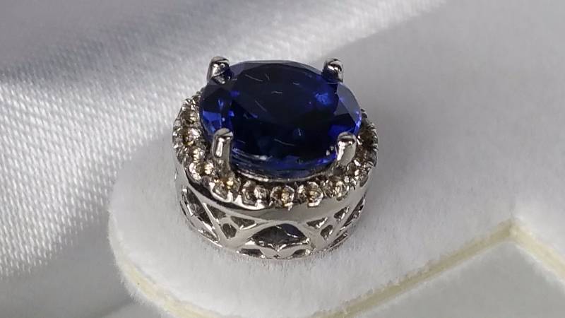 lot 21 image: White and Blue Sapphire Earrings - Kohls Tag $650