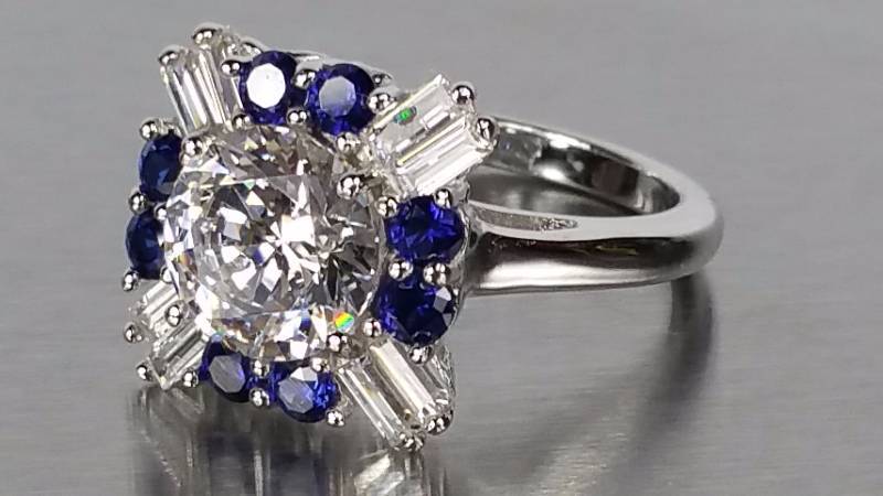 lot 38 image: Flawless White and Blue Sapphire Ring