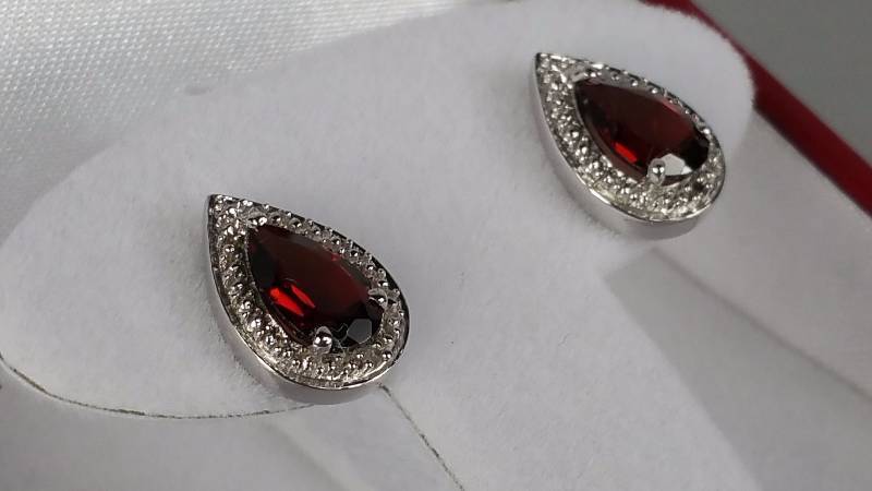lot 47 image: Garnet and Diamond Earrings