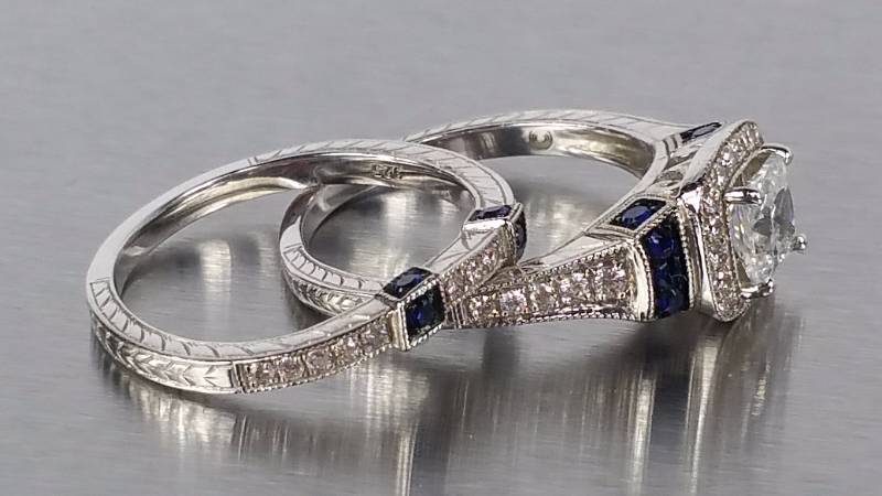 lot 84 image: White and Blue Sapphire Wedding Ring Set