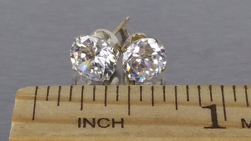lot 100 image: White Sapphire Earrings