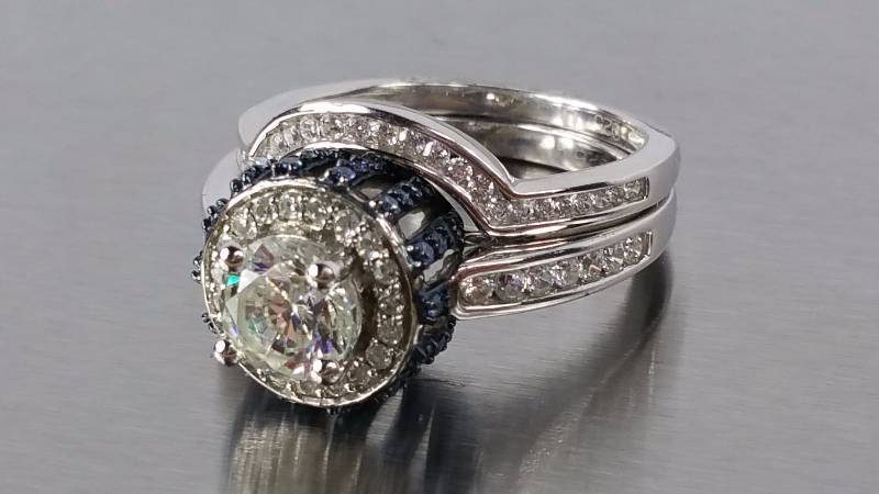 lot 116 image: White and Blue Sapphire Wedding Ring Set