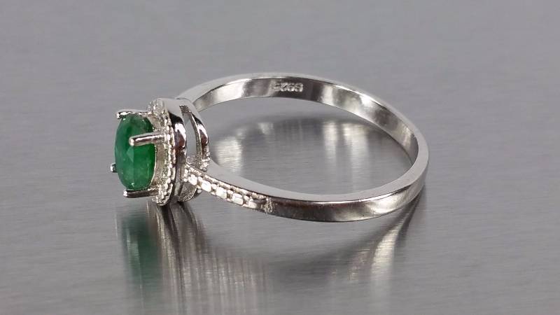 lot 146 image: Emerald and Diamond Ring