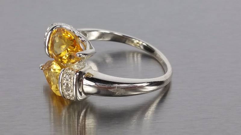 lot 161 image: Citrine and Diamond Ring