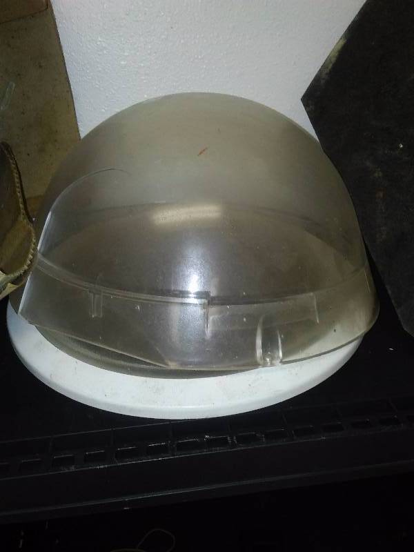 lot 13 image: The Illuminator Tunnel Skylight - New in box. 10 inches. Perfect way to get natural light into a room without giving up too much R value.  Crack in globe