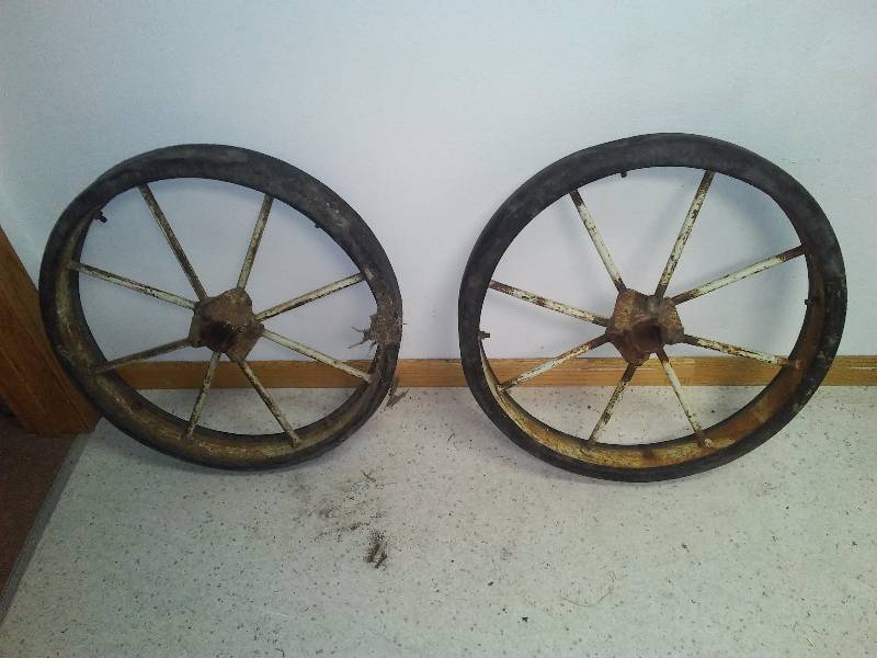 lot 36 image: Vintage Steel wheels (2), rubber tread, square hub design