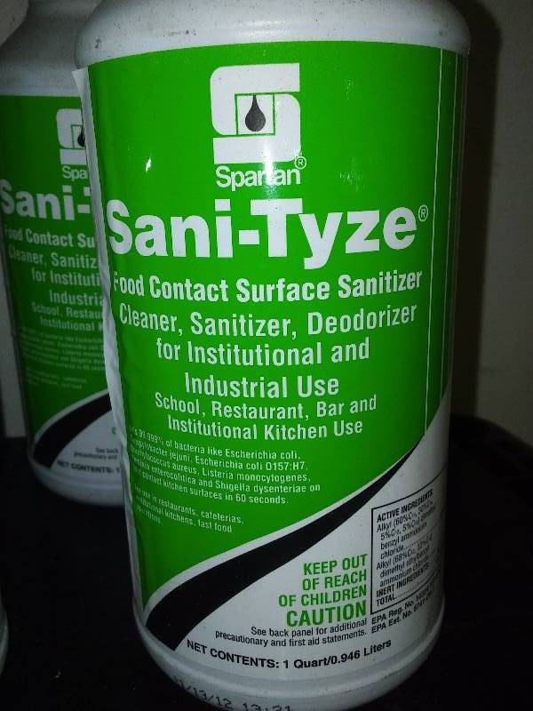 lot 107 image: Sanitizer and Window Cleaner (8) Each bottle is 1 qt.