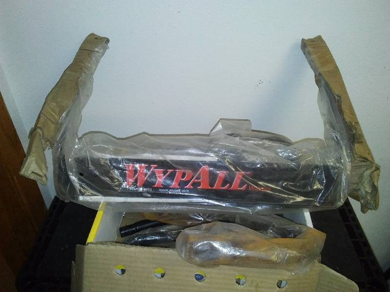 lot 125 image: Kimberly KCHWM WYPALL Jumbo Roll Dispenser (2)- Wall-Mount, NEW, one is complete, the other is missing the towel rod