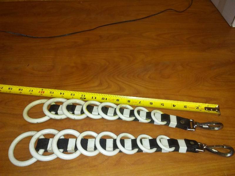 lot 178 image: Black and White Spreaders for Reins, 17 inches