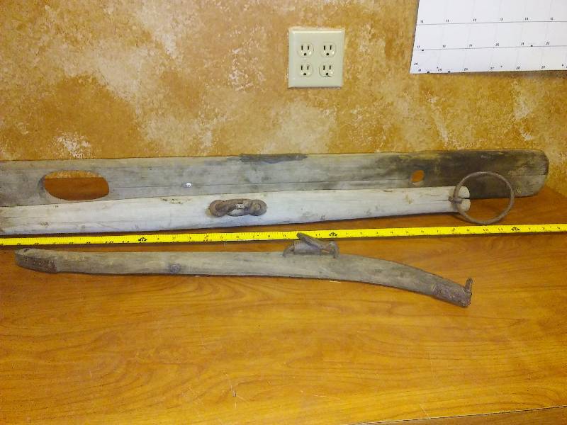 lot 187 image: Antique 42-inch level, 33-inch leveler bar and horse hame