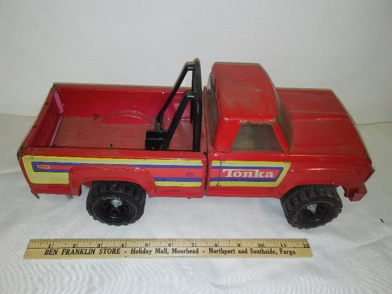 lot 11 image: Tonka Truck, Red with Roll bar, good tires, wheels axels