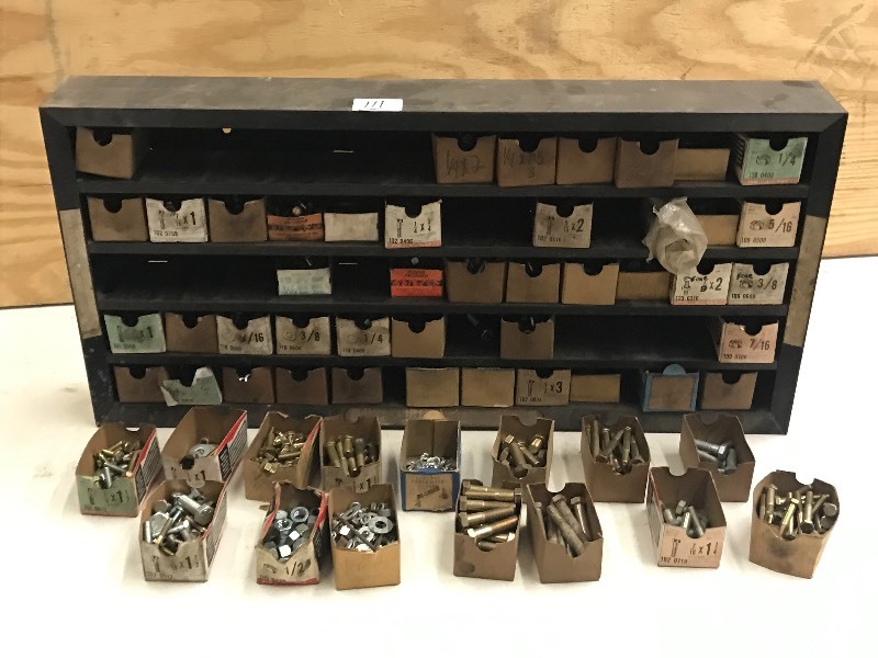 lot 111 image: Parts Rack Full Of Assorted Nuts-Bo...