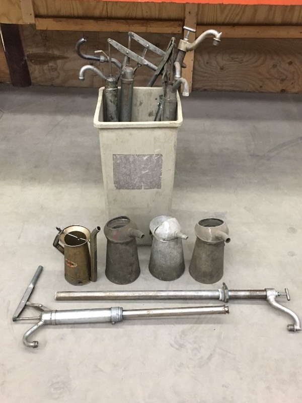 lot 2 image: Tote Full Of Vintage Barrel Pumps &...