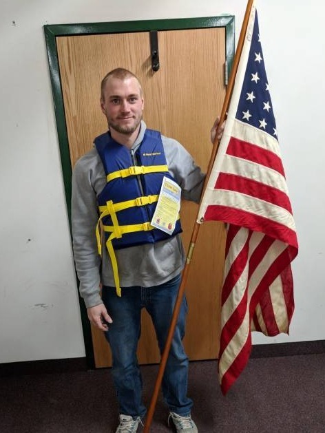lot 329 image: (4)West Marine Life Vests