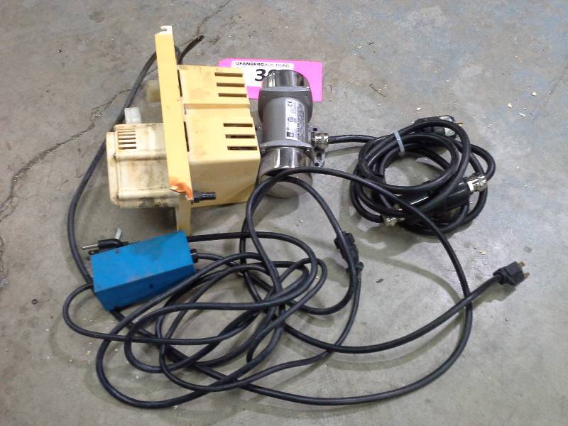 lot 39 image: Intertek Oli Electric Vibrator and Pump