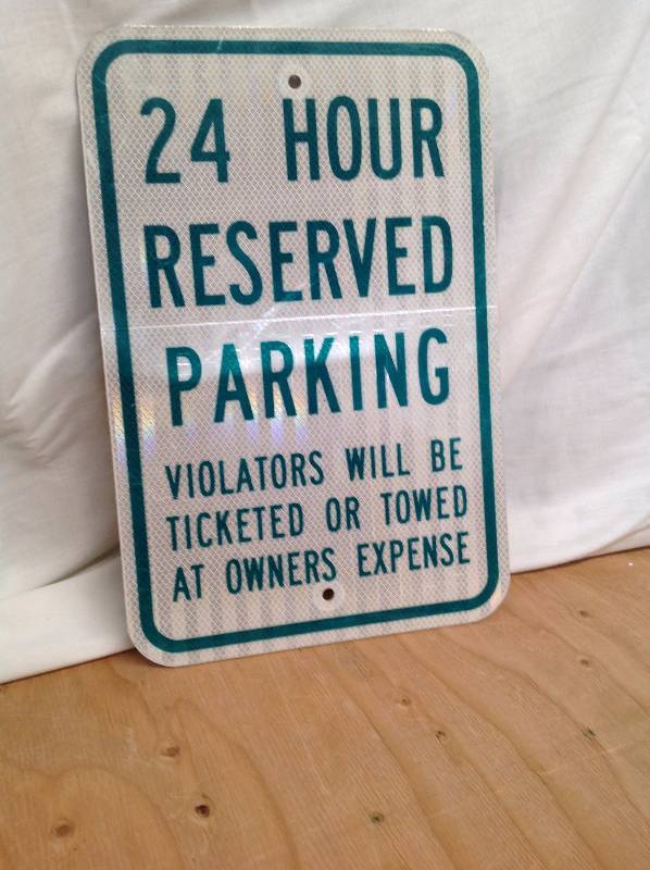 lot 5 image: 24 Hour Reserved Parking Sign