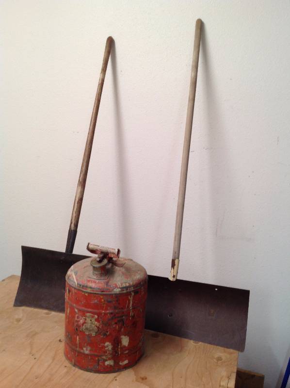 lot 22 image: Older Gas Can and Two Snow Shovels