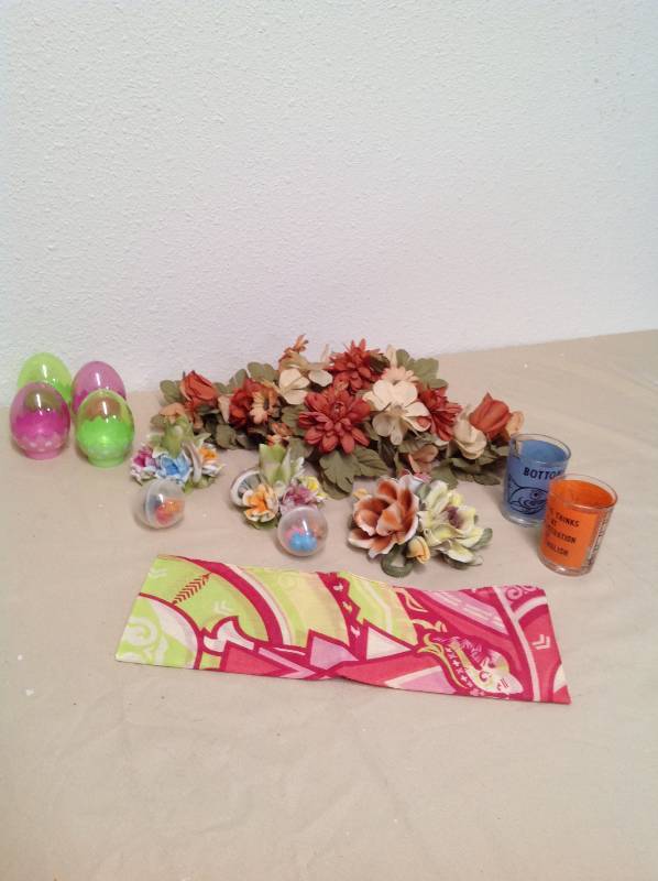 lot 68 image: 2 flower candle stick holders, breast cancer scarf, center piece and 2 shot glasses