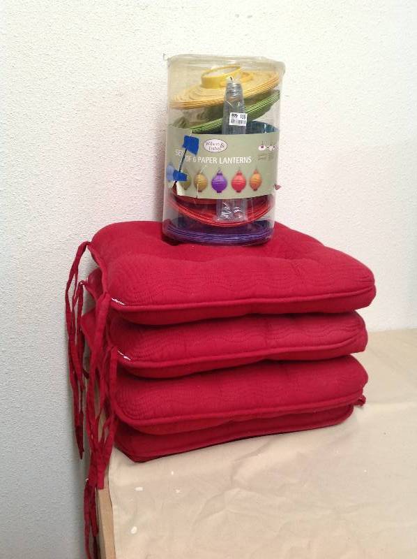 lot 79 image: four Red Chair Cushions,  and Six Paper Lanterns