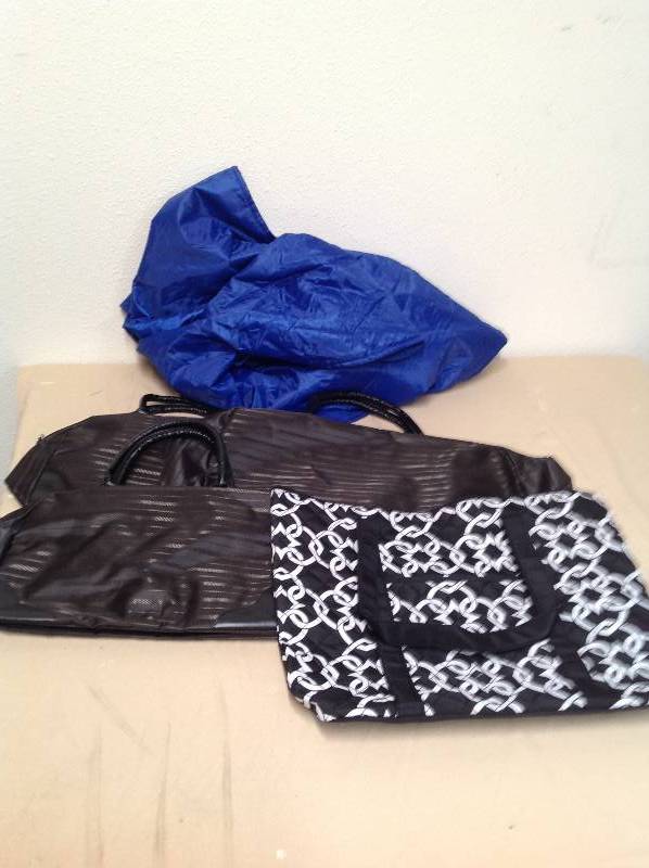 lot 93 image: Fleece lined Poncho and Four Bags