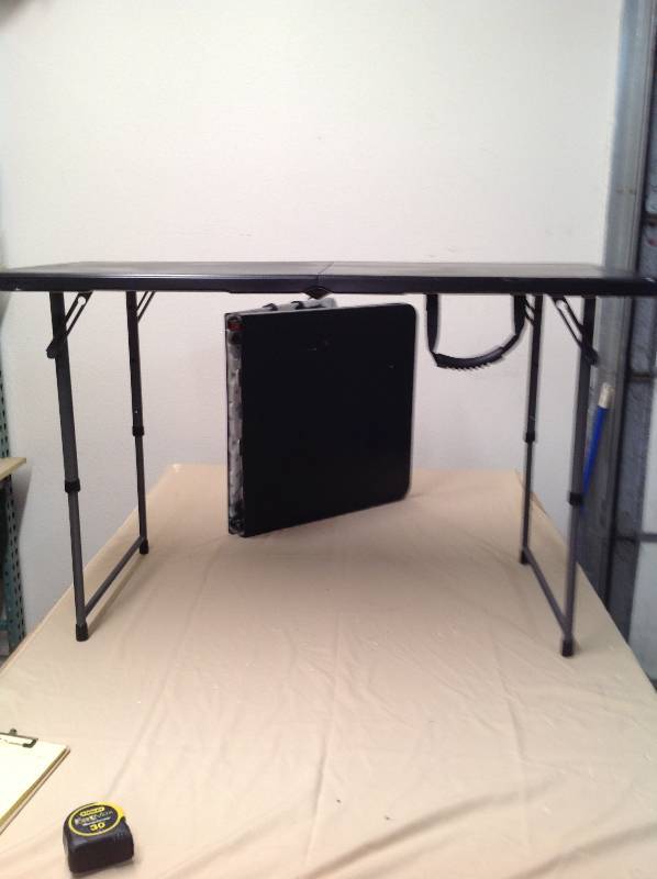 lot 27 image: Two Folding Tables Black