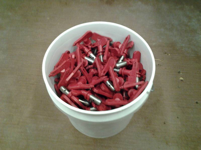 Pail Of Assorted Reversible Air Sprayer Tip Nozzles