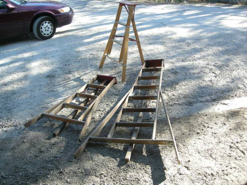 lot 14 image: 3 Red top Wood Ladders