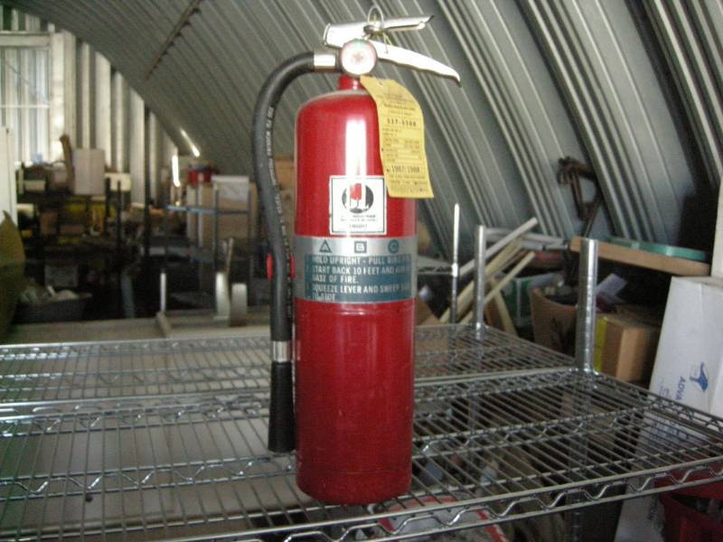 lot 79 image: Fire Extinguisher