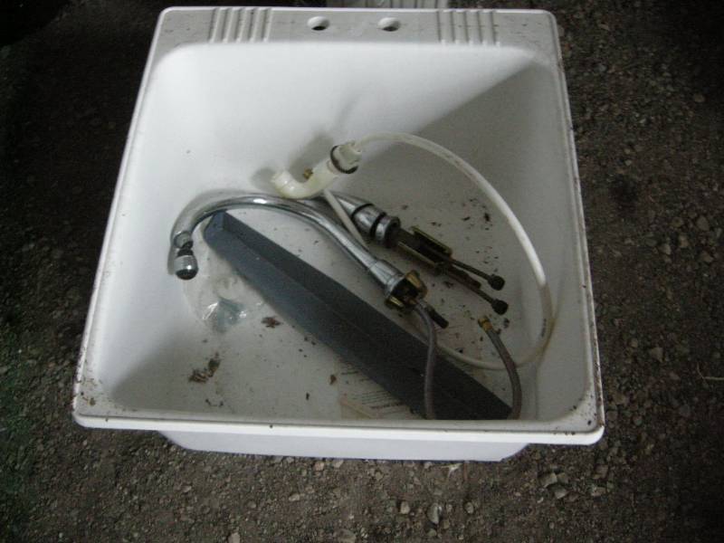 lot 128 image: Laundry Tub and Faucets