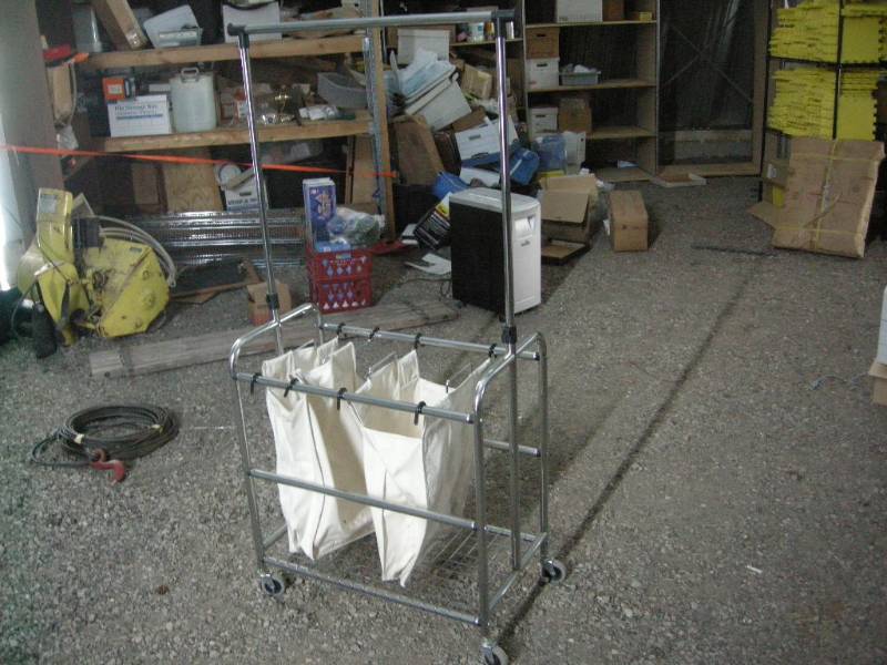 lot 153 image: Rolling Garment Hanging Rack