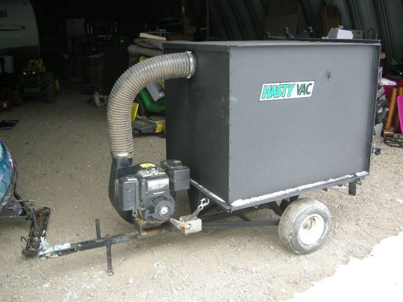 lot 7 image: Hasty Vac-Pull Behind Lawn Vacuum System