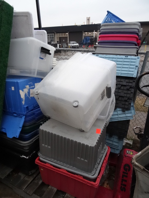 Large pallet of misc totes. All hea...