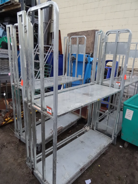 Fold up warehouse cart on wheels. 4...