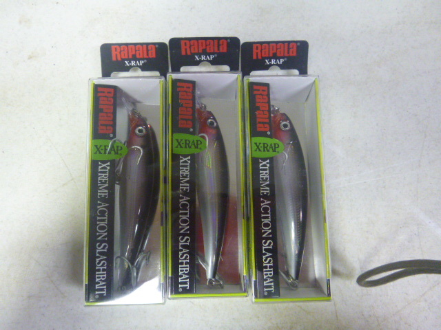lot 218 image: 3 Rapala X-Rap Lures