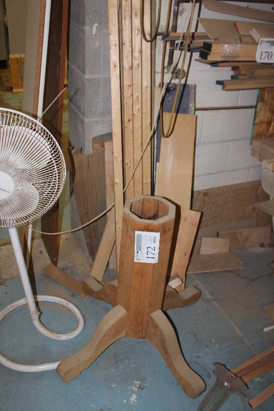 lot 172 image: wood table stand w misc. wood against wall