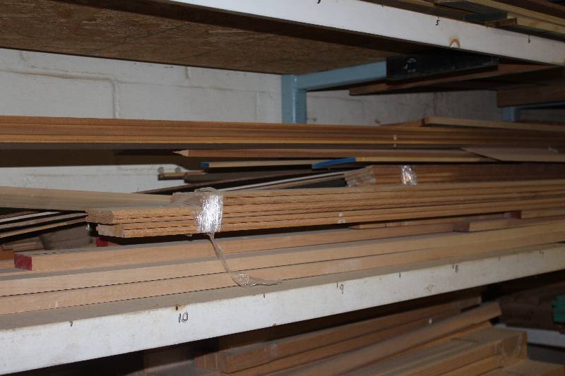 lot 151 image: entire shelf misc. wood and veneer