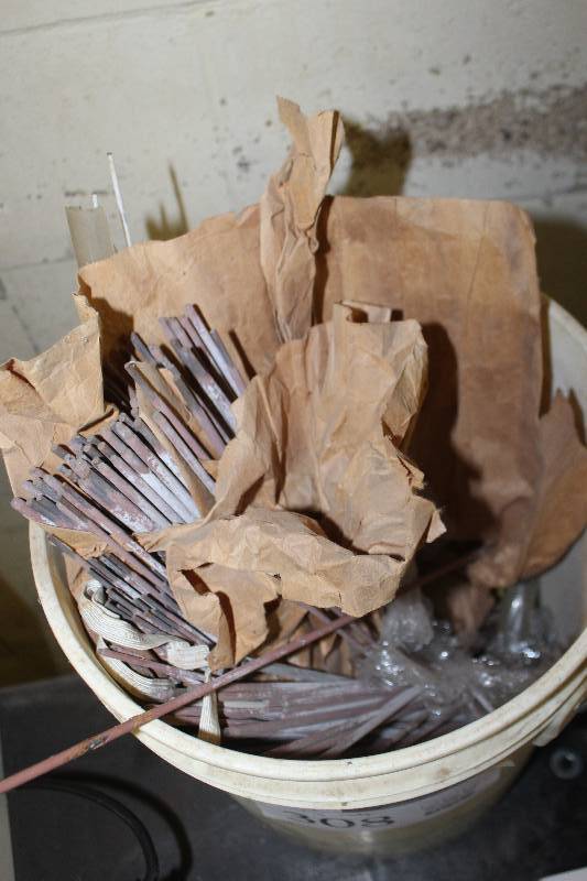 lot 308 image: 5 gal bucket welding rod