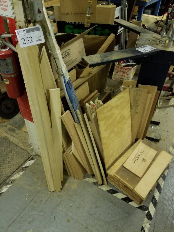 lot 252 image: Misc lot of wood under air hose in electric room