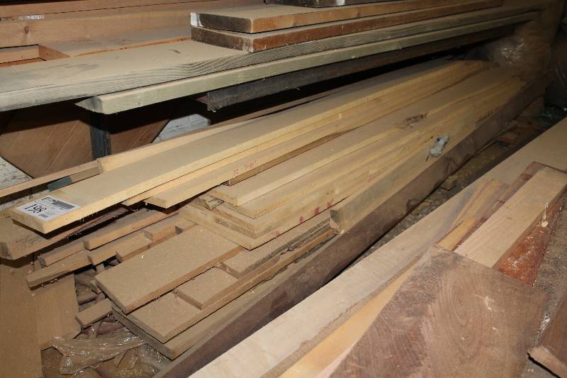 lot 198 image: shelf of wood on rack