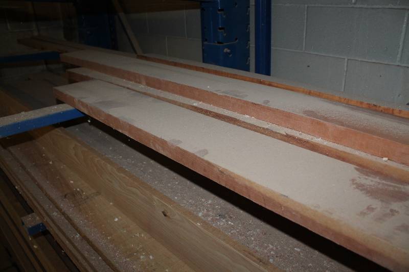 lot 208 image: Third shelf down wood south wall in bay