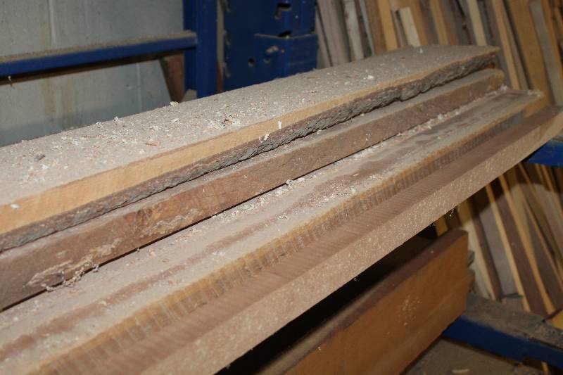 lot 207 image: Second from top shelf wood south wall in bay