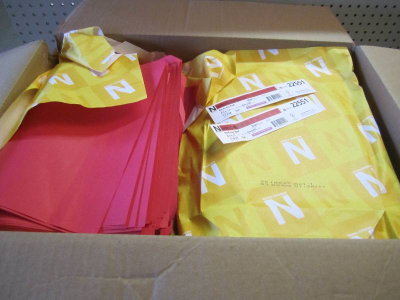 Large box full of Red Printer Paper...