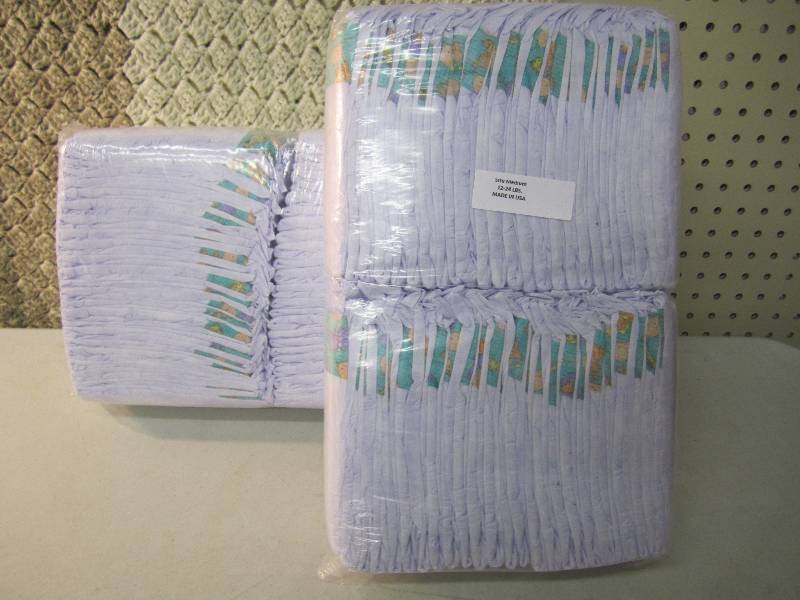 Lot of 100 Medium Diapers 12-24 pou...