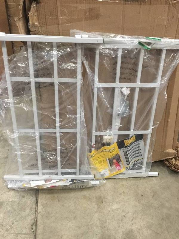lot 34 image: 31-54 in x 21 in. High Hinged 4-Bar Window Grill  OPEN BOX NEVER USED