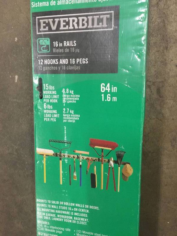 lot 36 image: Everbilt 16 in. Rails with 12 Hooks and 16 Pegs OPEN BOX NEVER USED